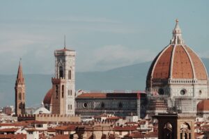 Indian students in Florence Italy near Duomo and River Arno studying at University of Florence