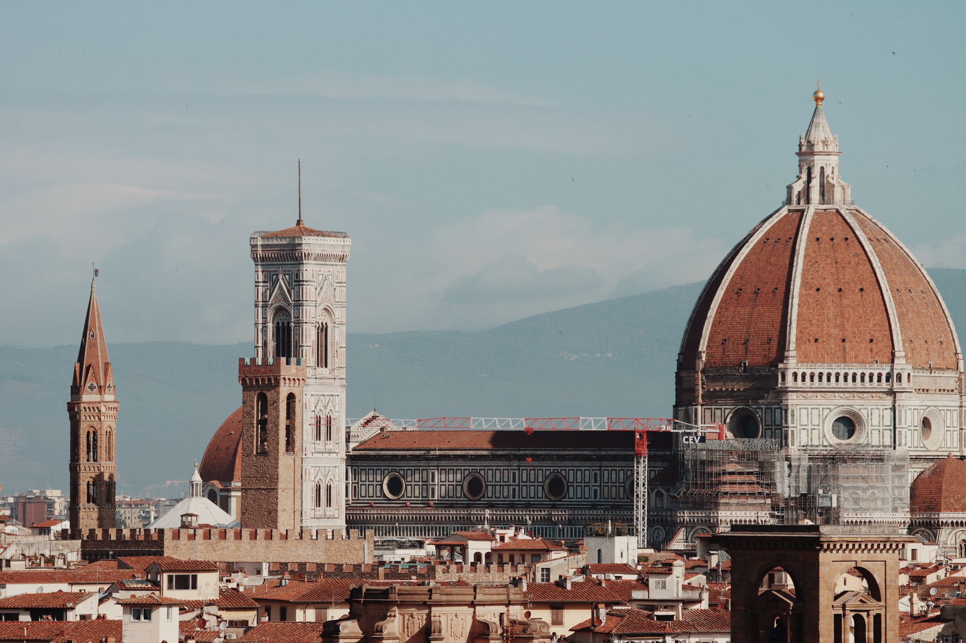 Indian students in Florence Italy near Duomo and River Arno studying at University of Florence