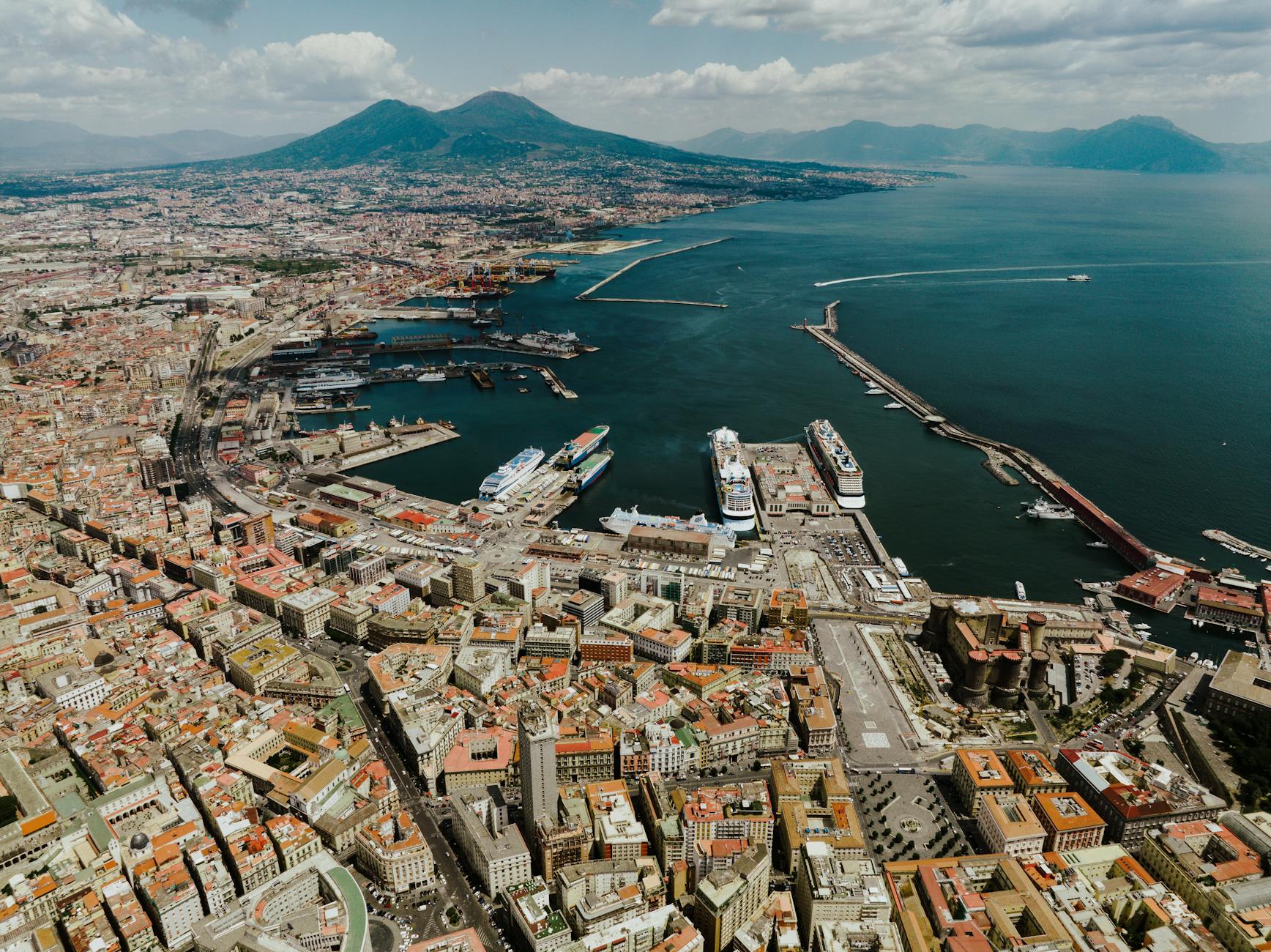 Indian students in Naples Campania Italy near Mount Vesuvius with Federico II university buildings