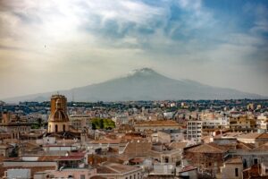 Indian students in Catania Sicily near Mount Etna Baroque architecture studying at University of Catania