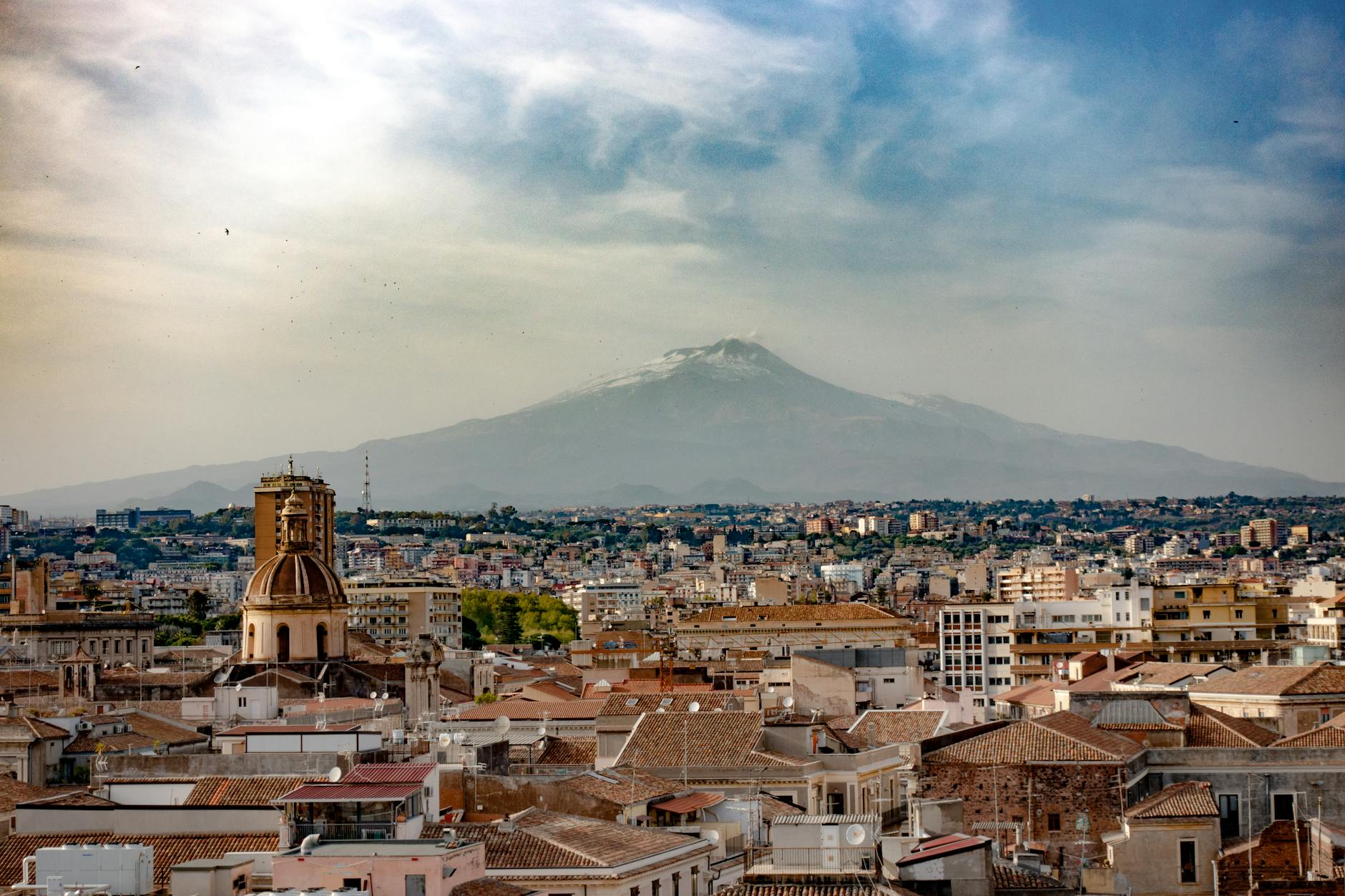Indian students in Catania Sicily near Mount Etna Baroque architecture studying at University of Catania