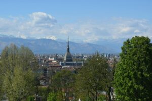 Indian students in Turin Piedmont Italy with Alps and PoliTo Politecnico di Torino campus