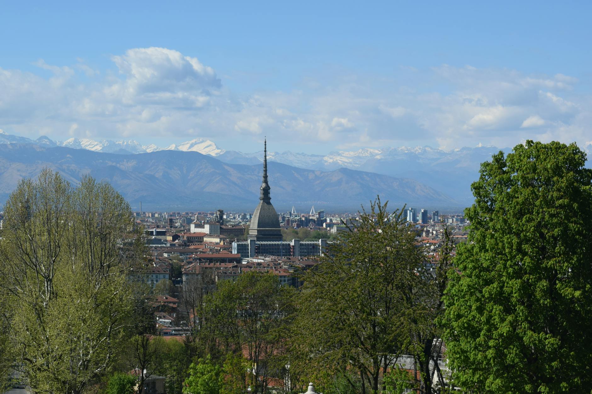 Indian students in Turin Piedmont Italy with Alps and PoliTo Politecnico di Torino campus