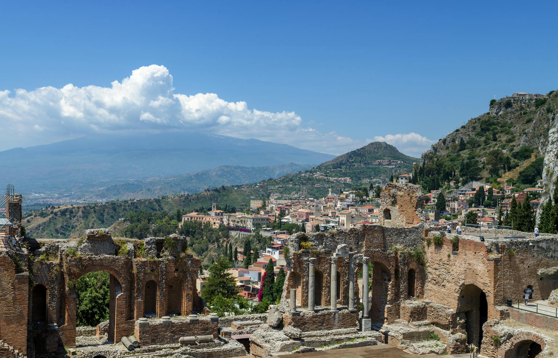 Indian students living in Sicily near Mount Etna choosing between Catania and Messina university