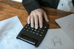 Indian student calculating ISEE for Italy scholarship eligibility with income documents from India